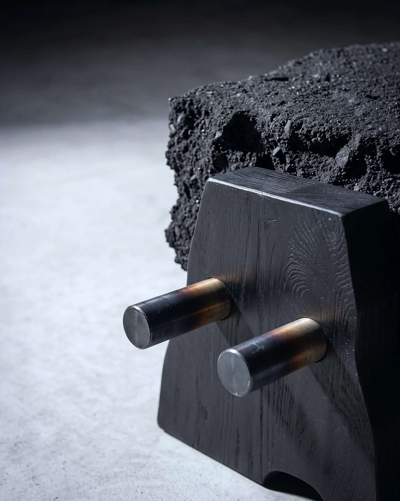 Close-up of the metal tubes, burned oak and sand surface, Aetna Bench, by Paul Hardy