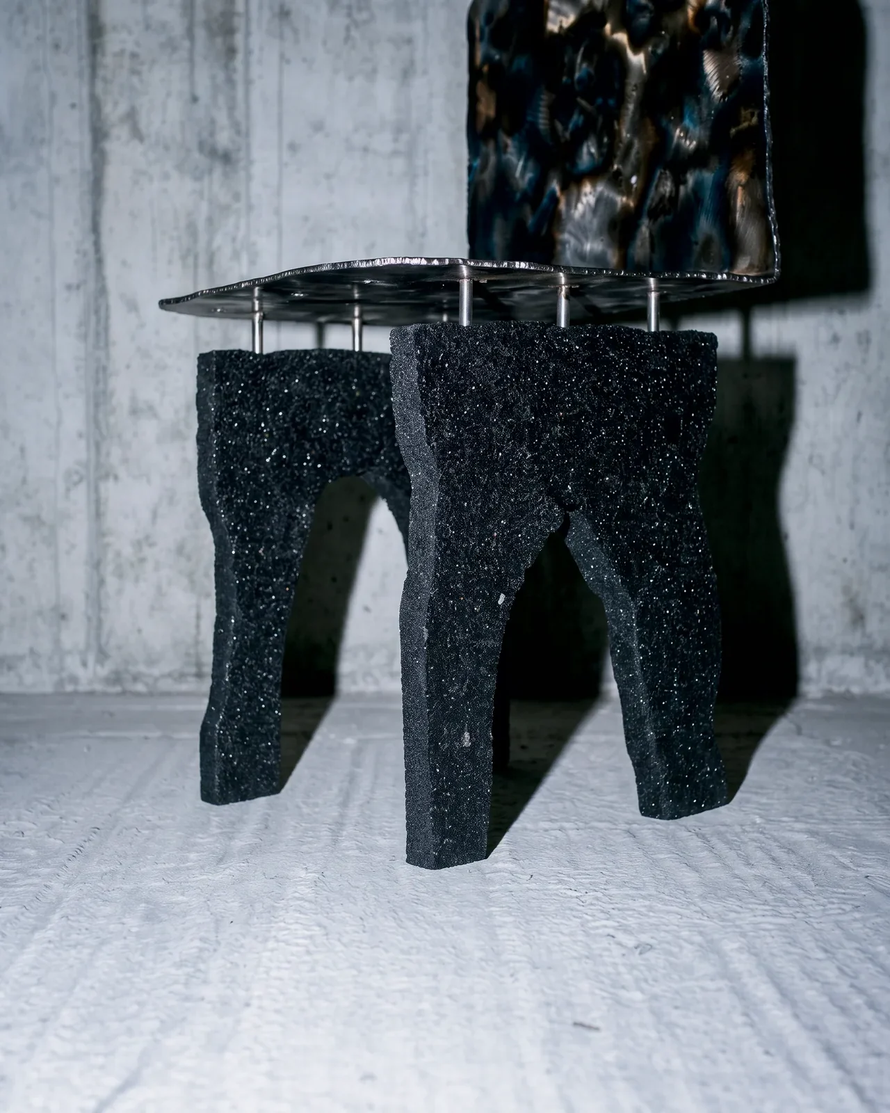 Mineral bases and steel rods of the Ustio Chair, by Paul Hardy