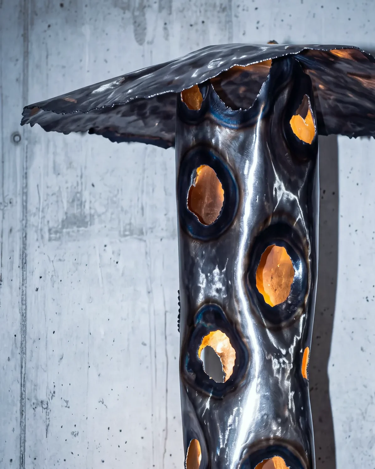 Hammered cap of the Ustio Lamp, by Paul Hardy