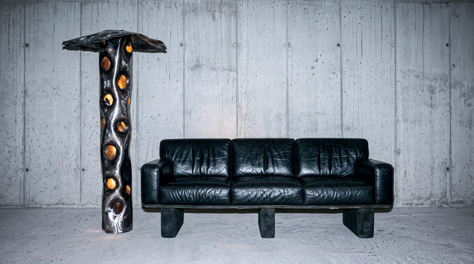 Ustio Sofa beside the Ustio Lamp, by Paul Hardy